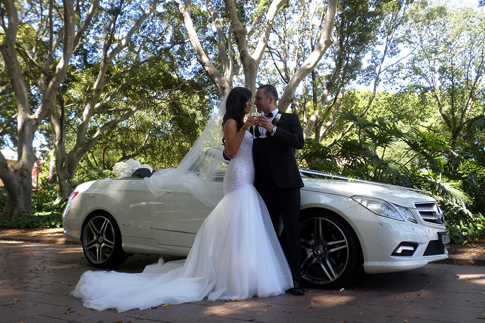 Couple at Wedding with Car