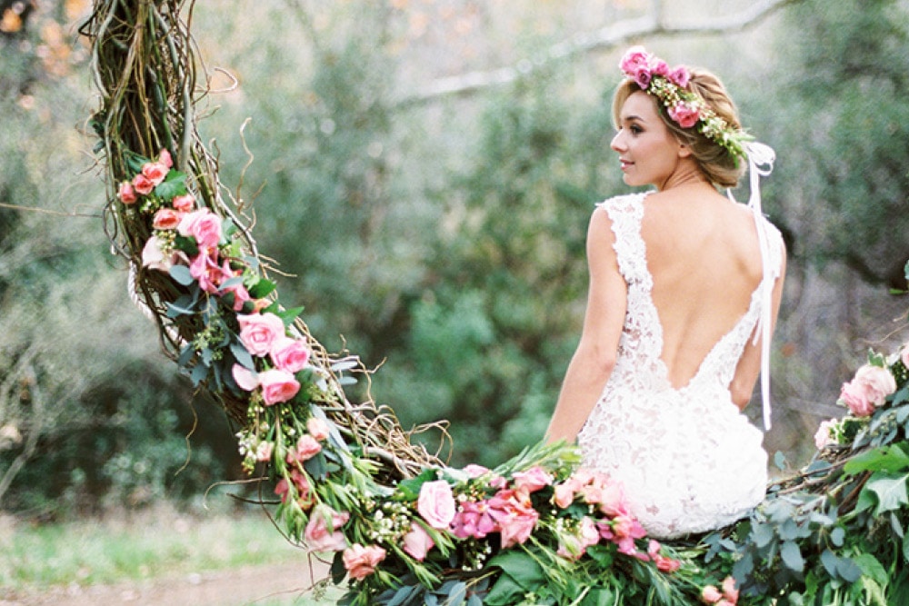 Bride in tree, floral, flowers, wedding